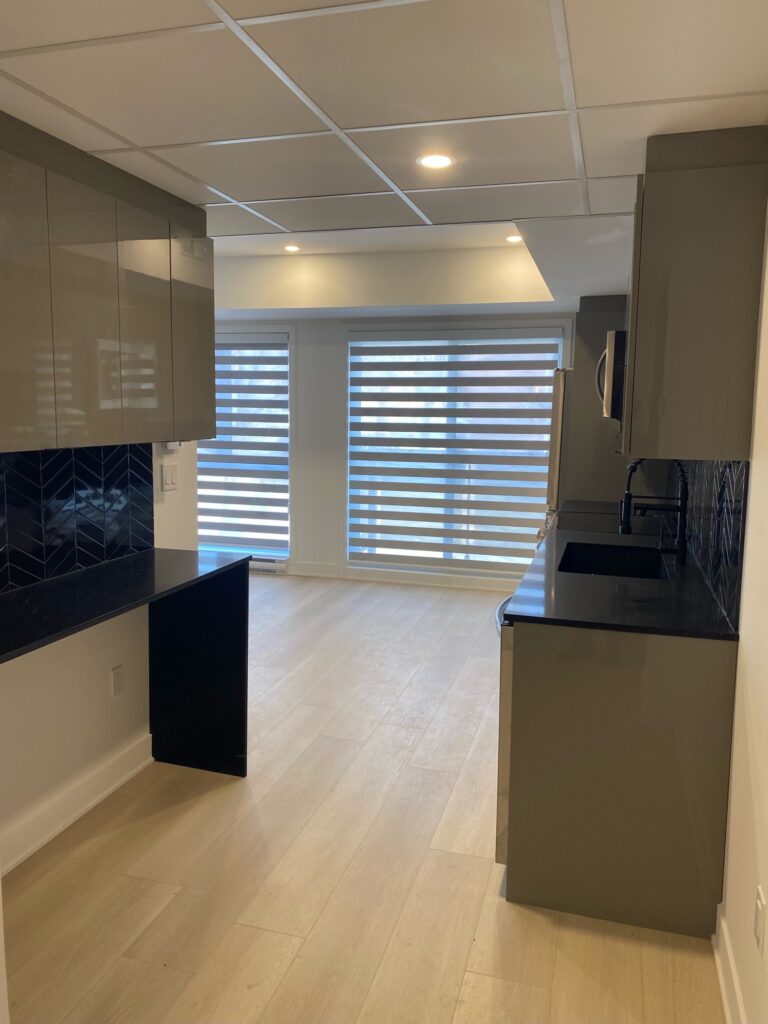 Kitchen with zebra shades by WestBlinds