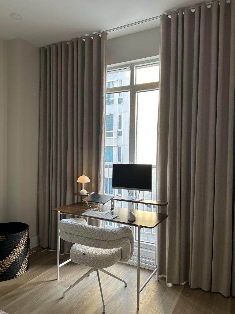 Office room showcasing custom-installed curtains by WestBlinds