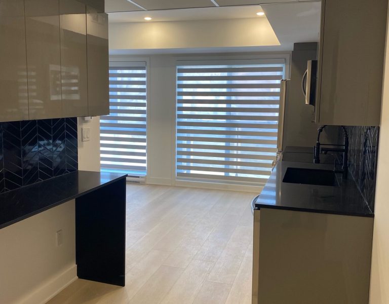 Kitchen with zebra shades by WestBlinds